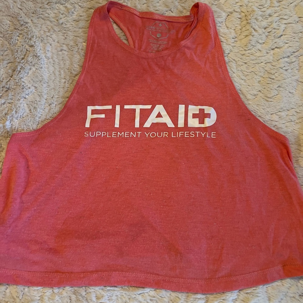 Fit Aide flowy crop top. Coral color.razor back